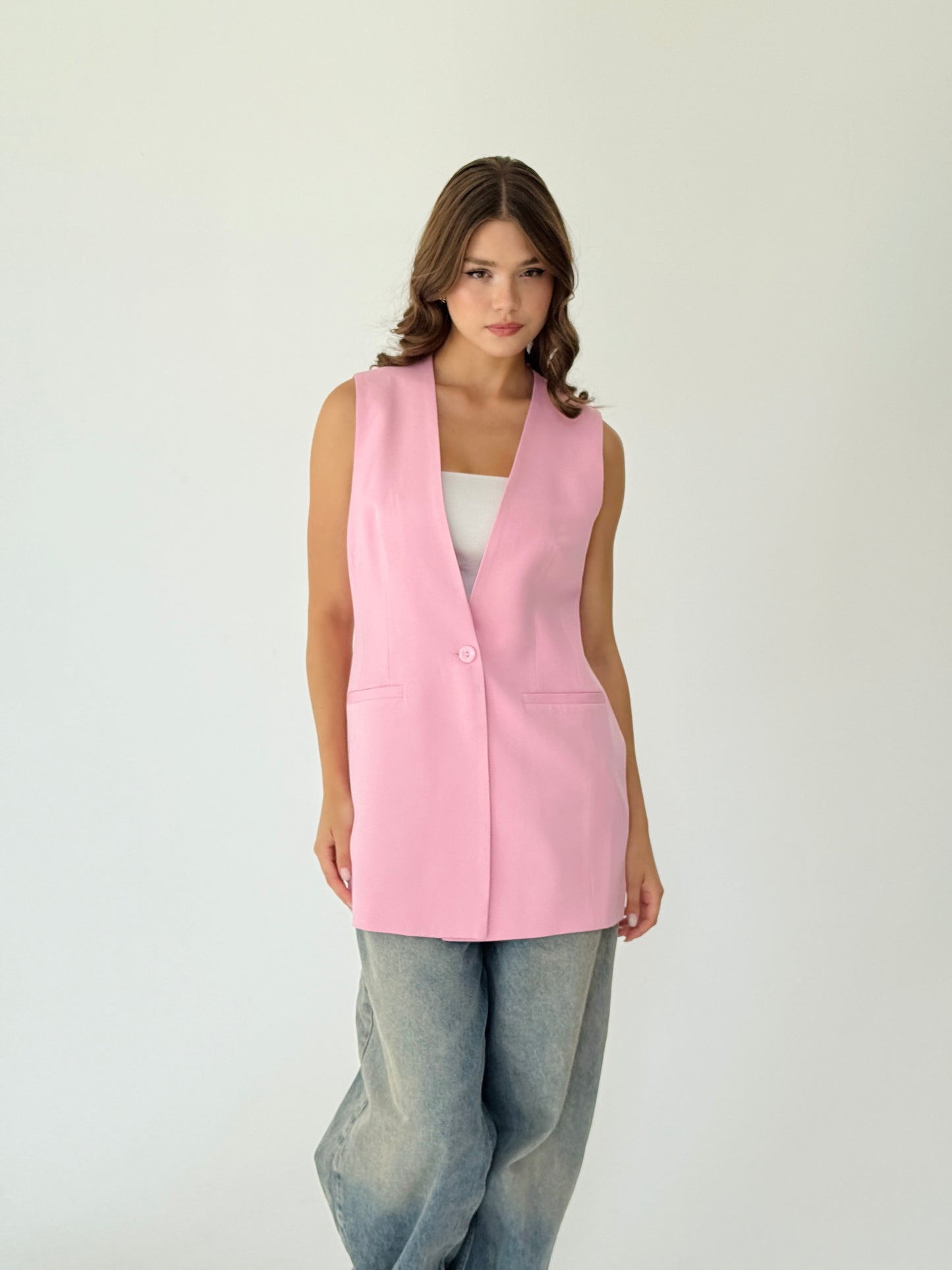 Collarless vest in pink