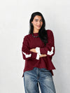 The statement Top in dark red
