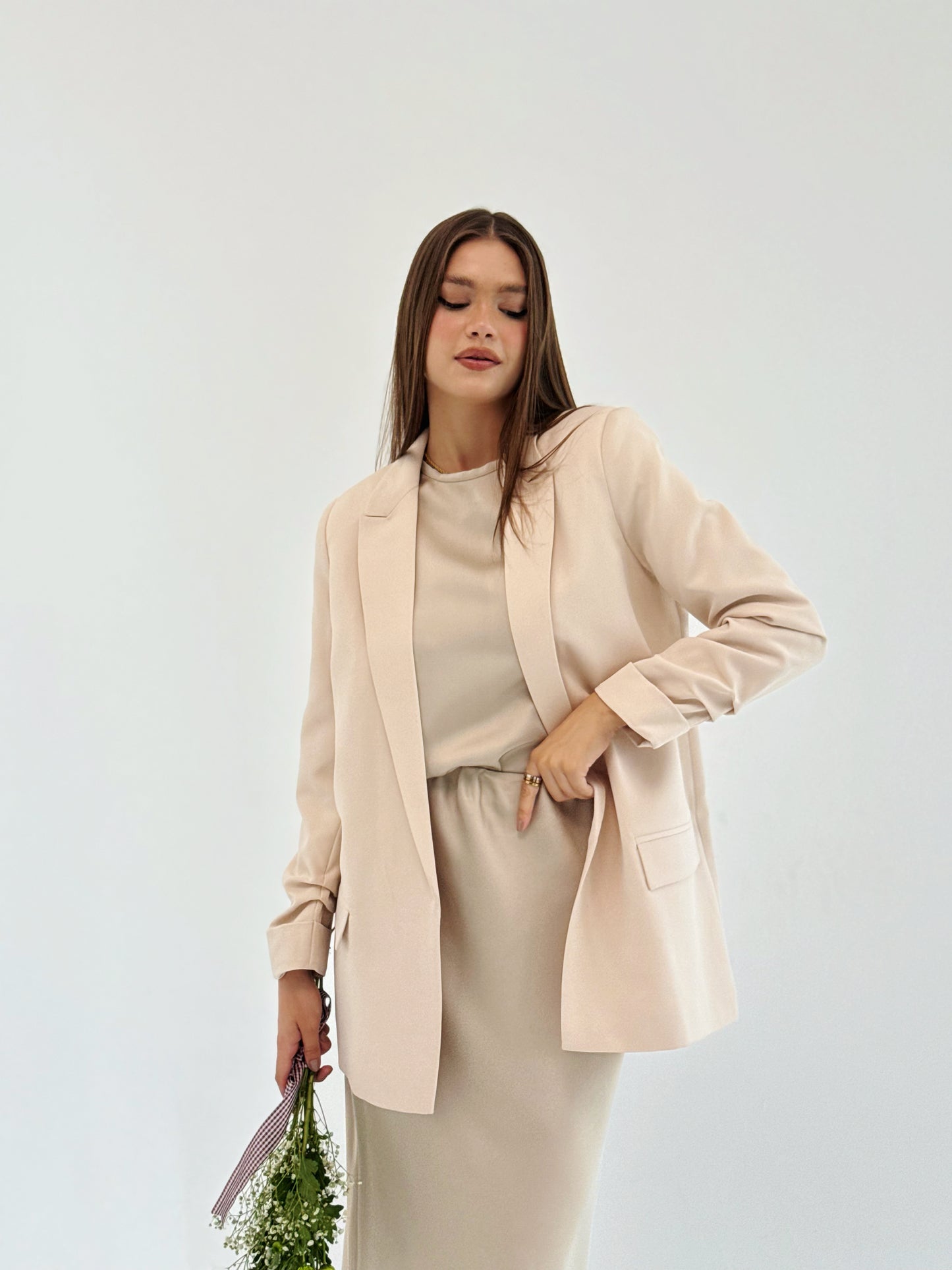 Ruffles Blazer in Beige.