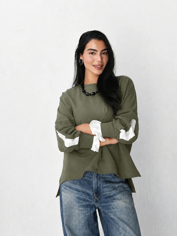The statement Top in mint green
