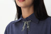Signature Charm pin in navy blue