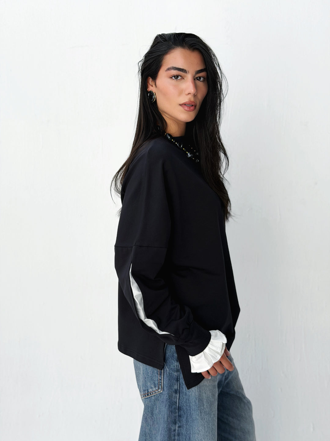 The statement Top in black