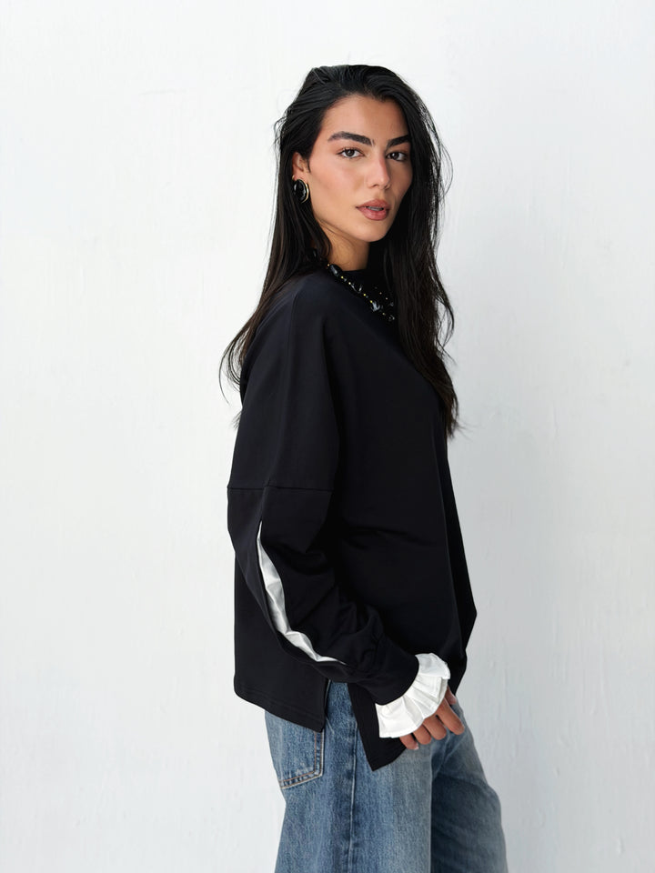 The statement Top in black