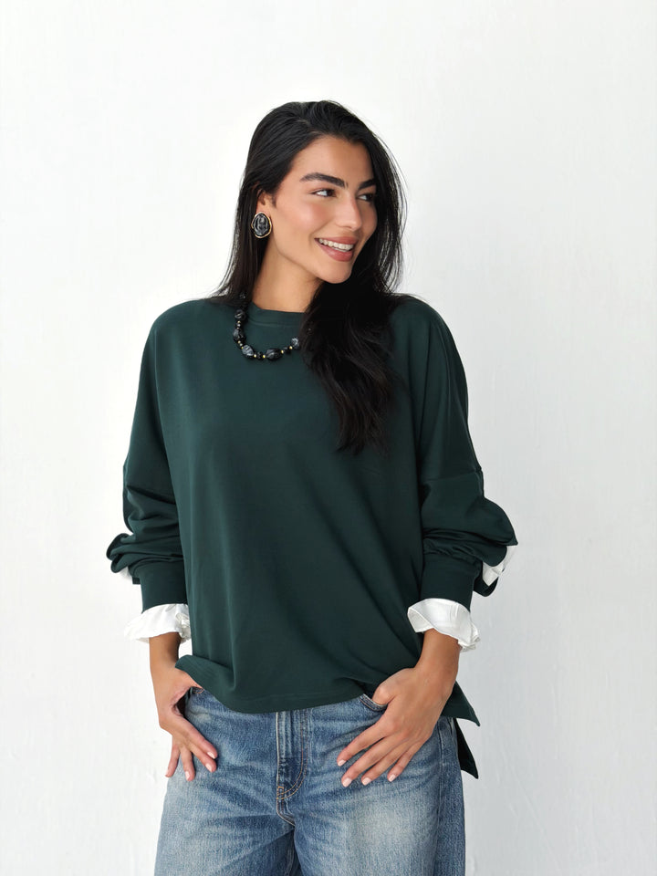 The statement Top in dark olive