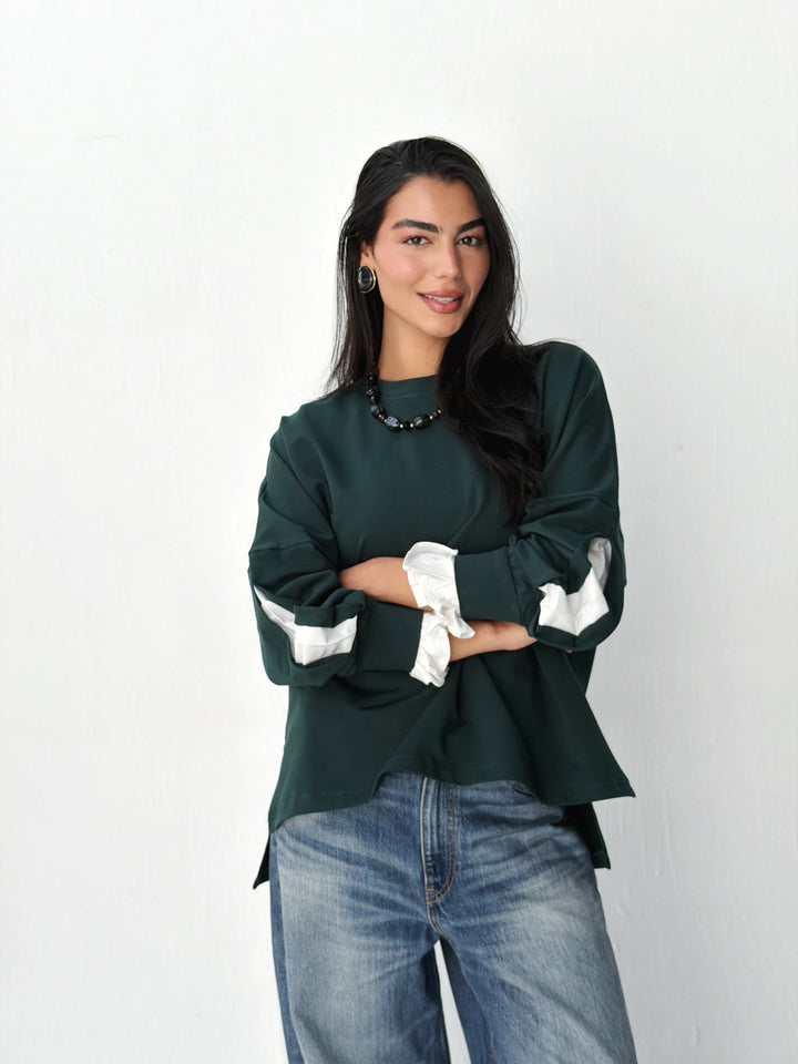 The statement Top in dark olive