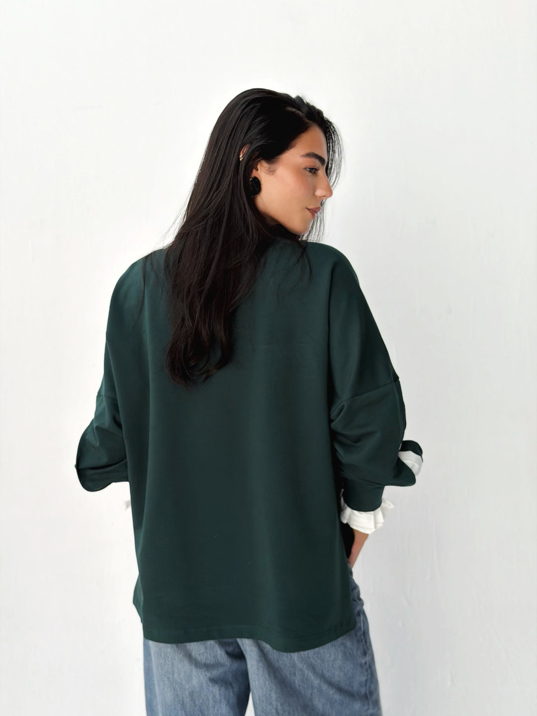 The statement Top in dark olive