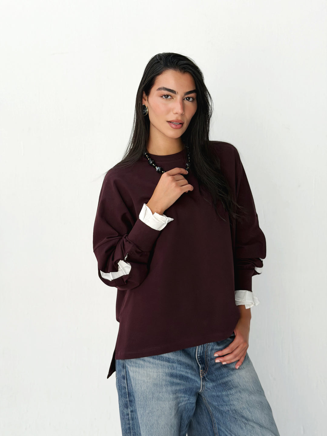 The statement Top in burgundy