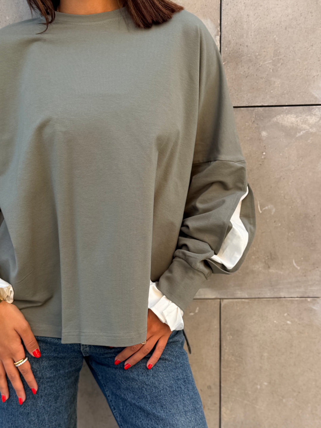 The statement Top in mint green
