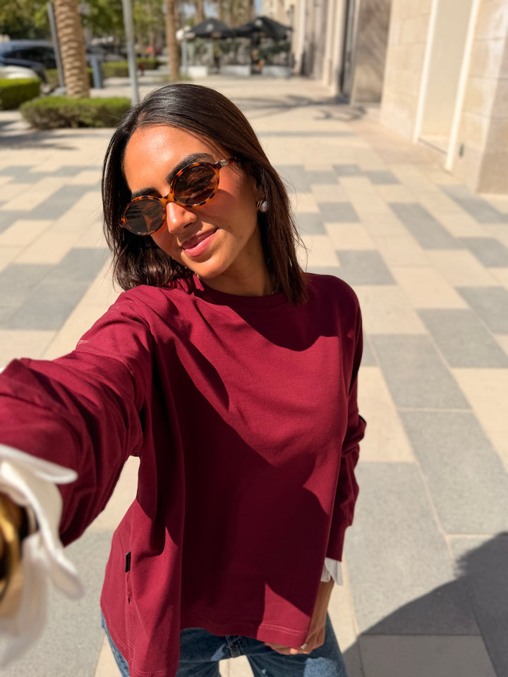 The statement Top in dark red